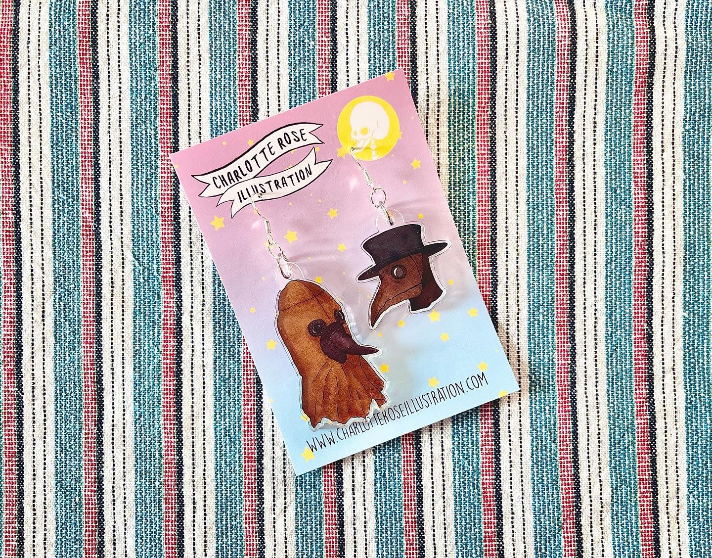 original mismatch plague doctor earrings by charlotte rose