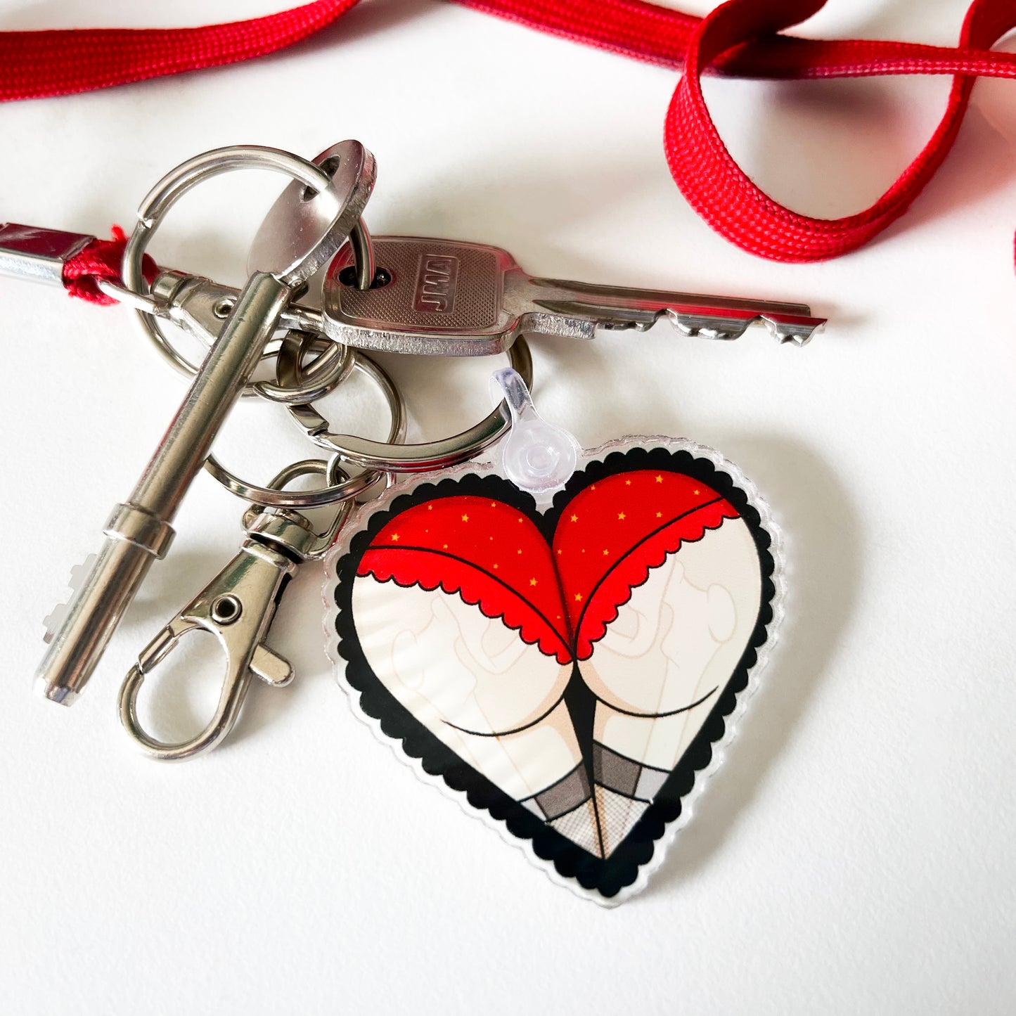 original sexy bum heart tattoo design keyring from charlotte rose