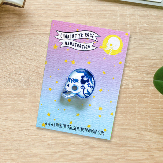original blue and white delft pottery style floral skull pin bade by charlotte rose