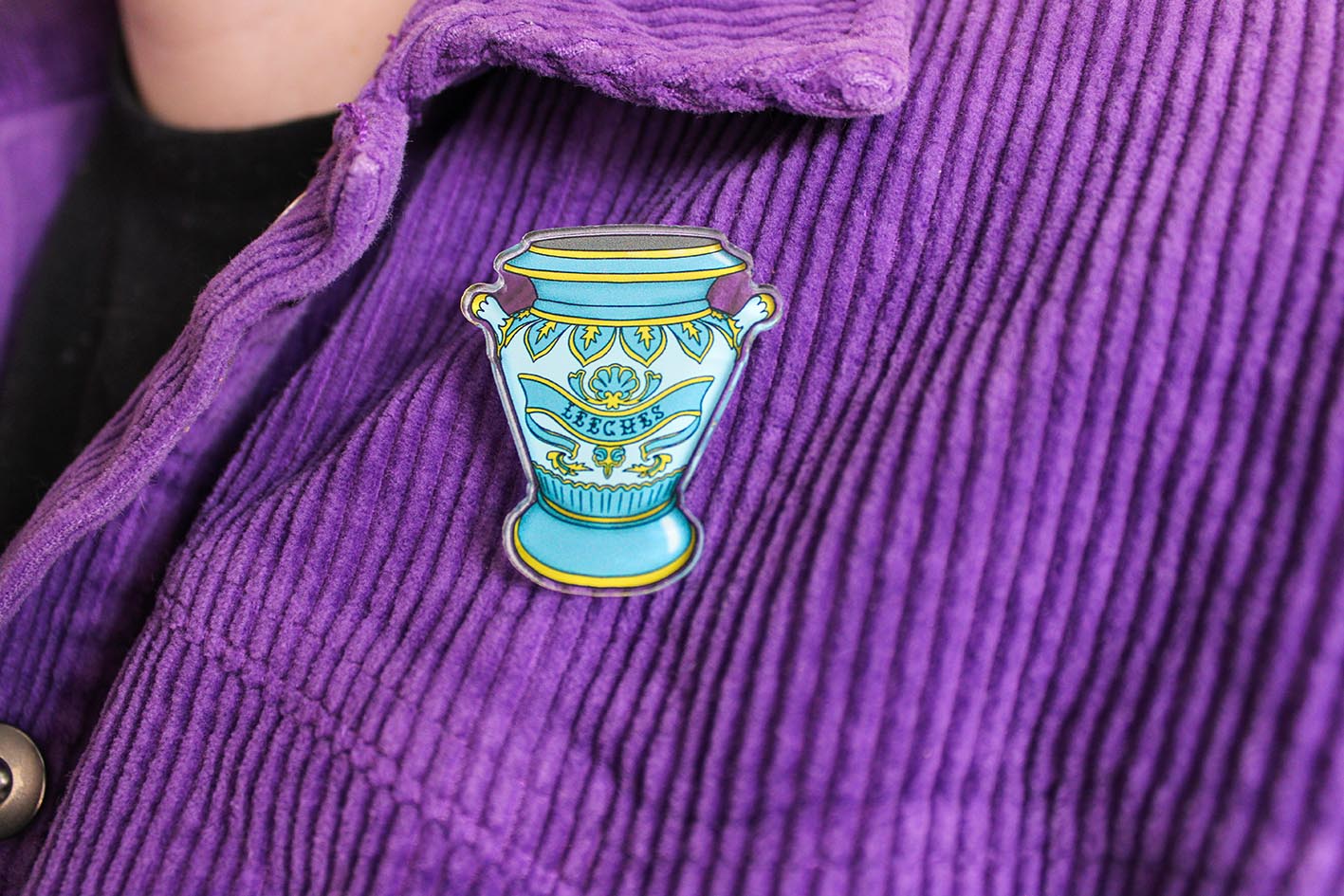 original blue and gold decorative leech vase pin badge from charlotte rose