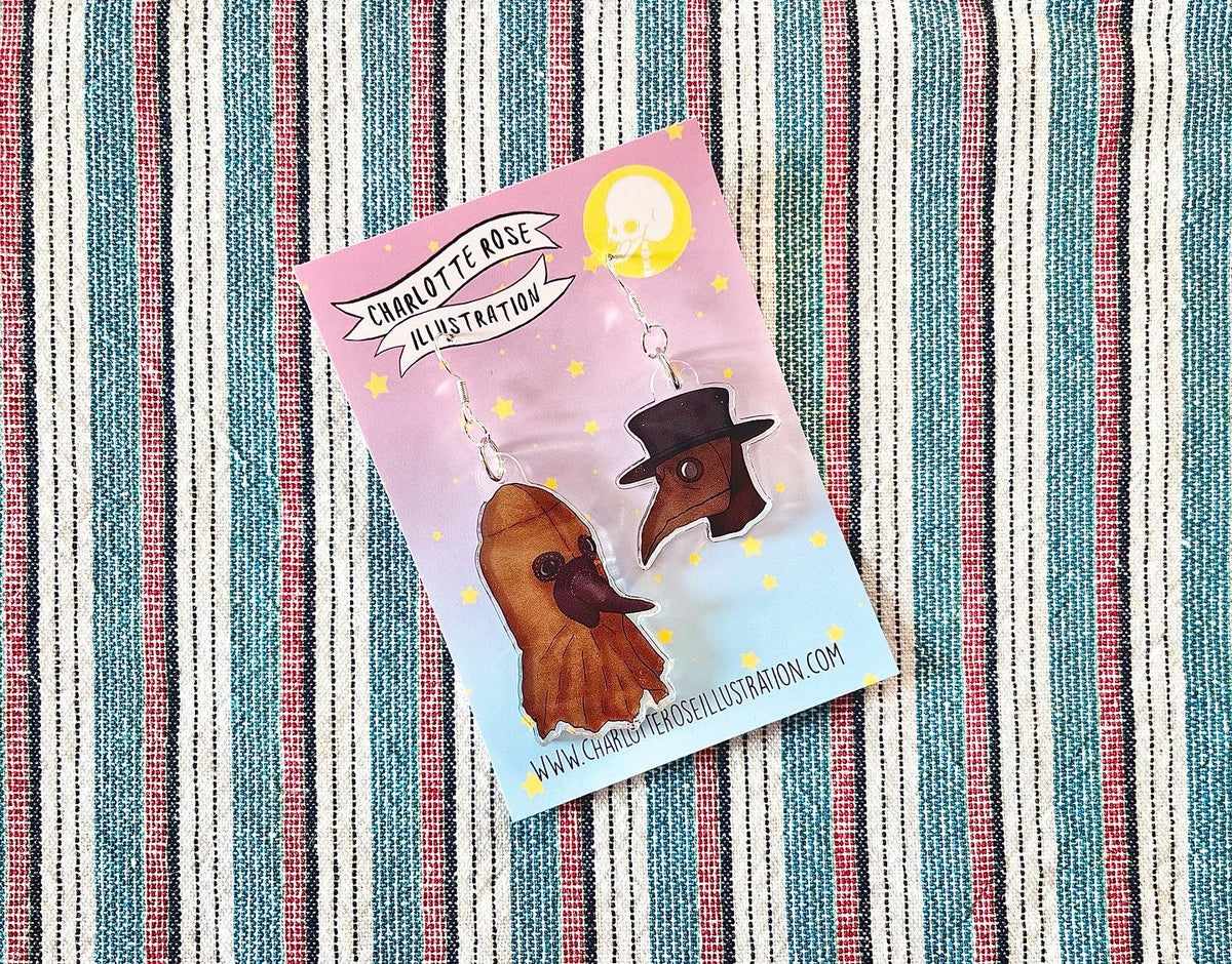 original mismatch plague doctor earrings by charlotte rose