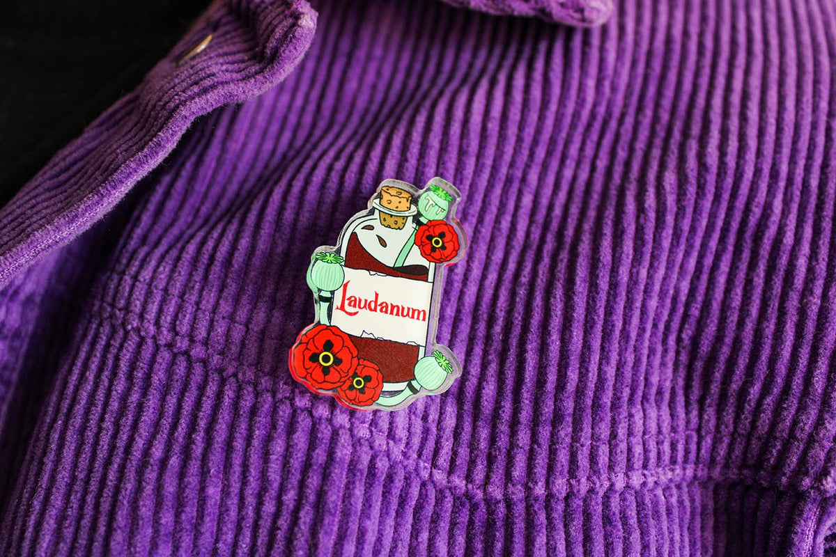 original laudanum bottle pin badge from charlotte rose with poppies 
